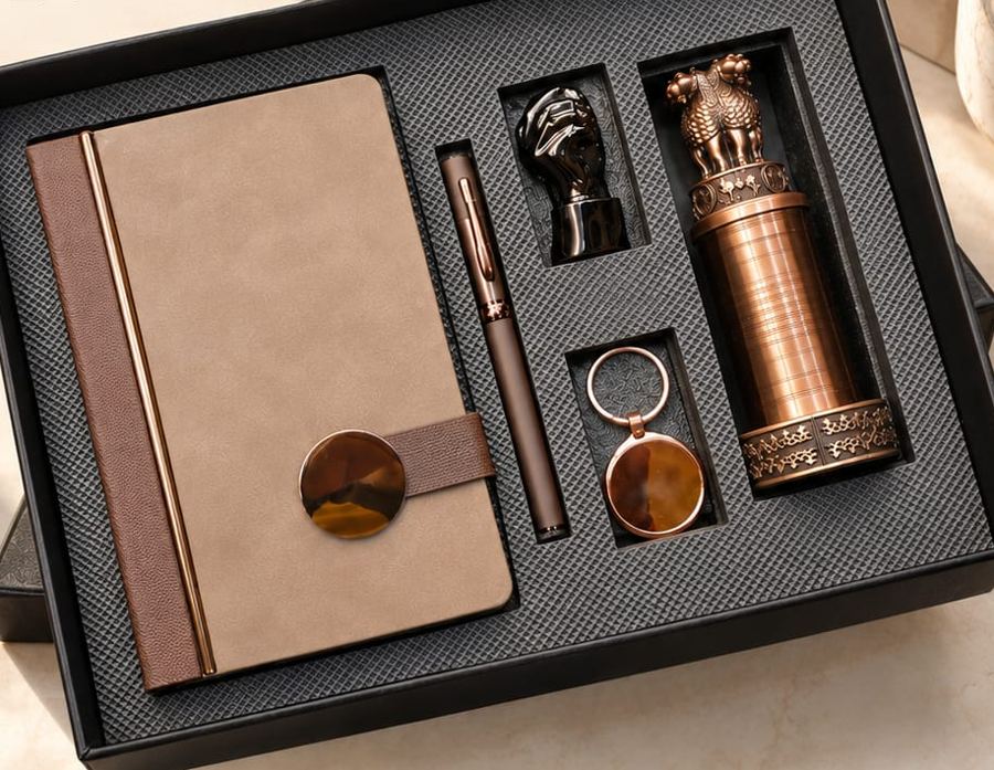 5 in 1 corporate gift set with A5 notebook, metal pen, keychain, pen stand and Ashoka Stambh in a black box